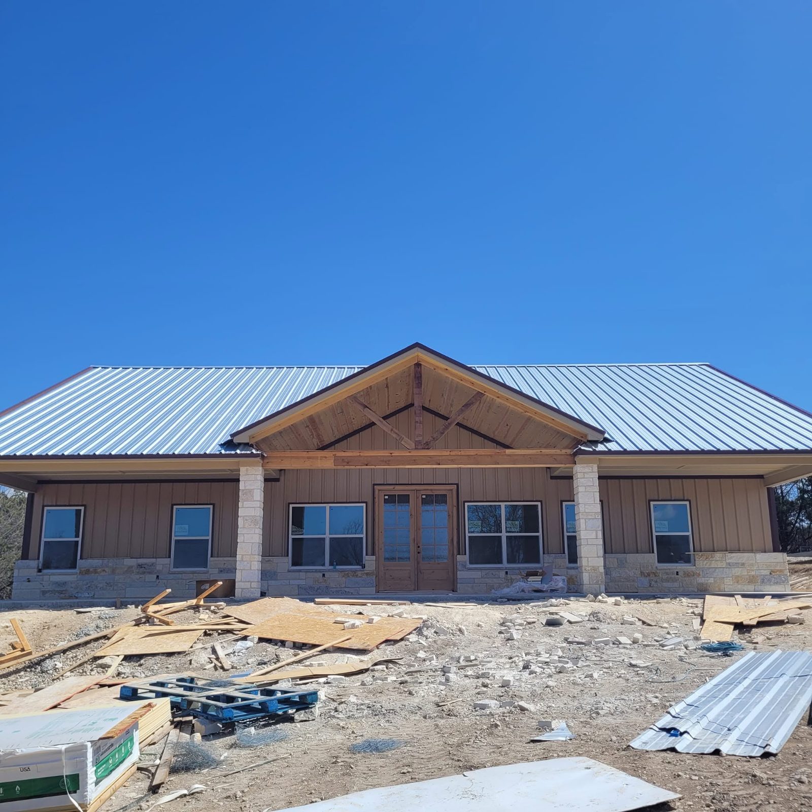 Sheeted and trimmed the walls and roof on this house build!
